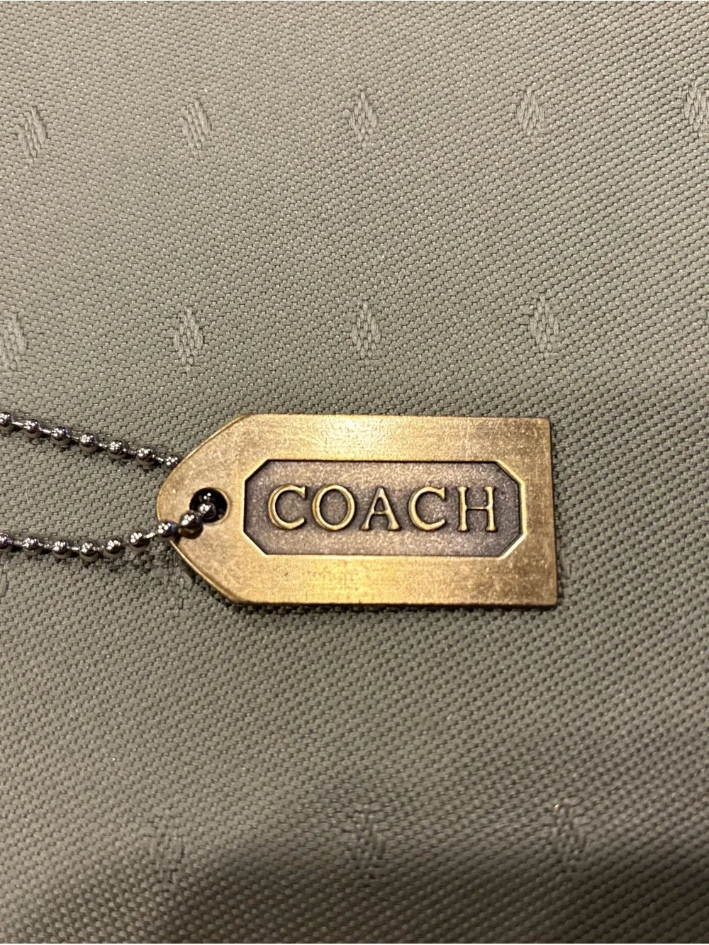 Brush Gold Metal COACH Hangtag